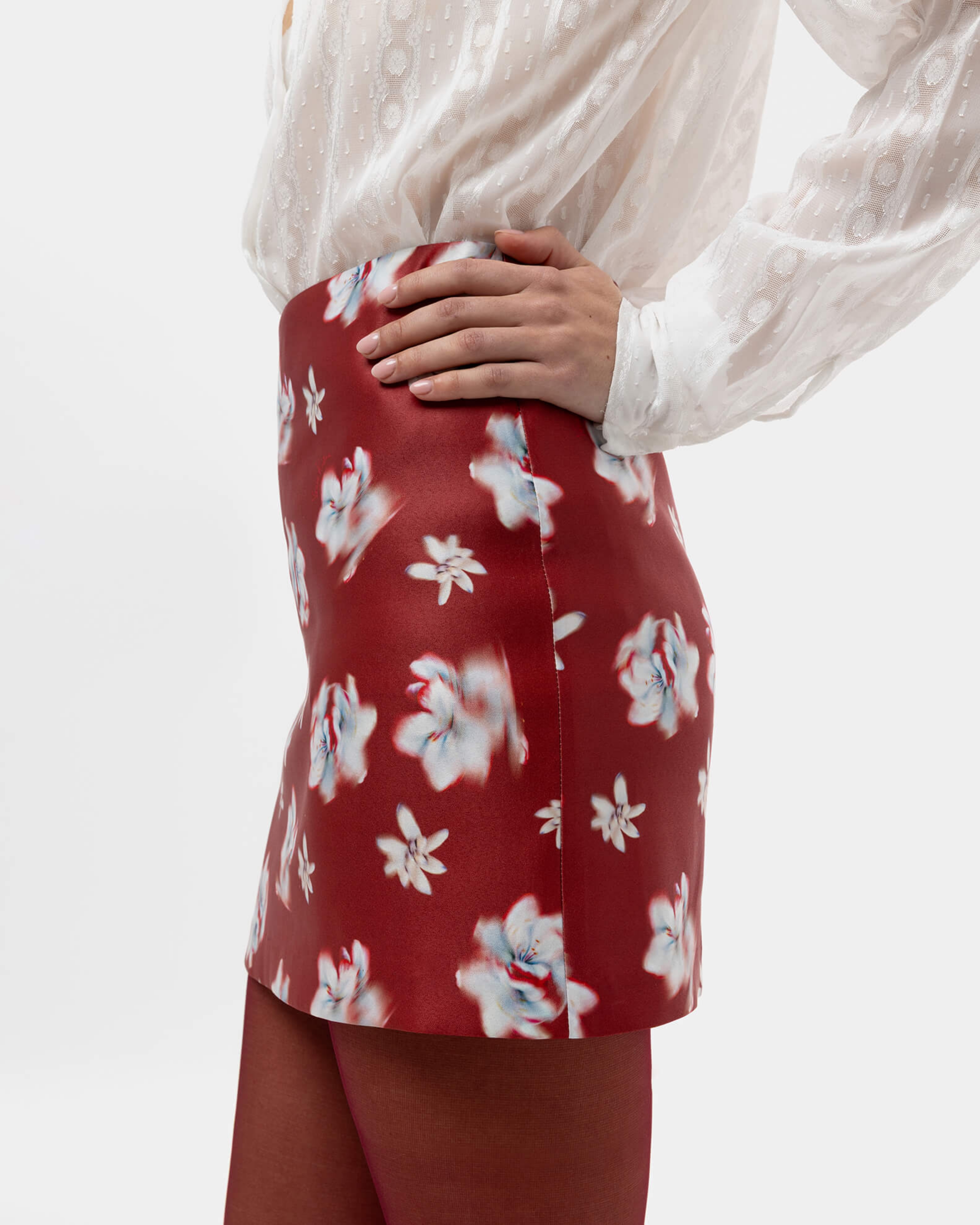 Picture of ABSTRACT FLOWER MINI SKIRT