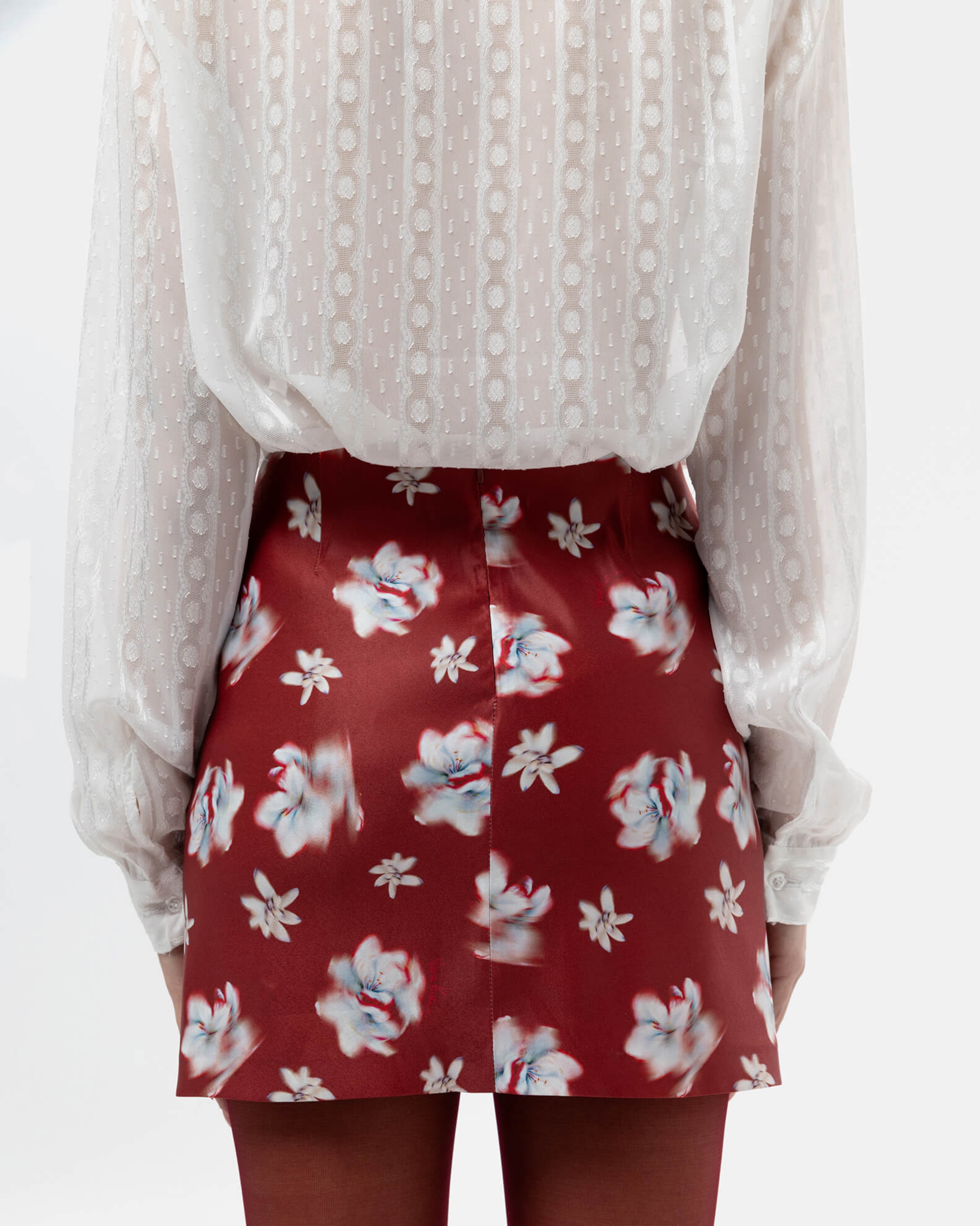 Picture of ABSTRACT FLOWER MINI SKIRT